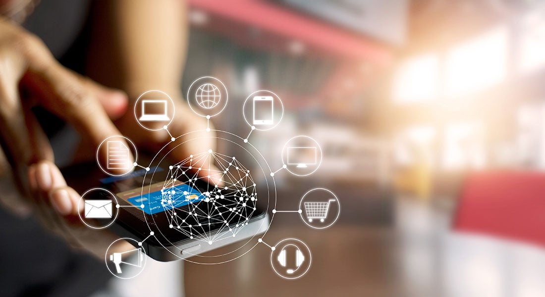 Smartphone displaying integrated payment technology supporting online, in-person, and mobile payment experiences.